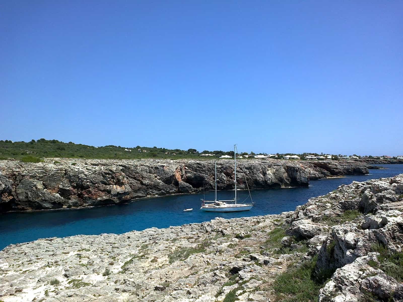 Turquoise cove along the coast of Menorca, Spain